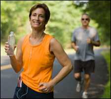 A woman and a man jogging