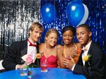 Four young adults at party