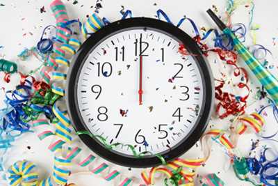Photo: Clock with confetti around it