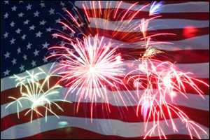 Fireworks superimposed on a U.S. flag