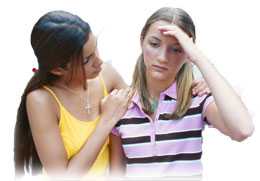Teenage girl consoling friend