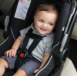 Photo: little boy in car seat