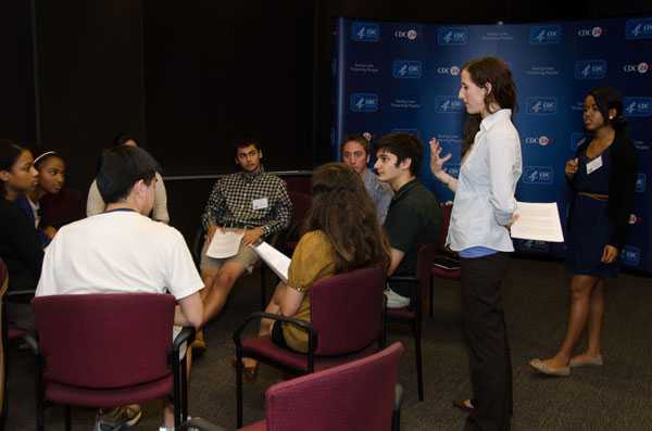 CDC subject matter experts prepare campers to represent the agency in a press conference.