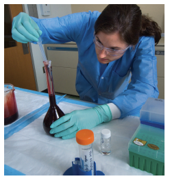 	CDC laboratorian enriching blood for use in quality assurance tests