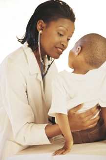 healthcare provider checking child