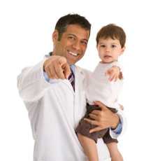 Doctor holding little boy