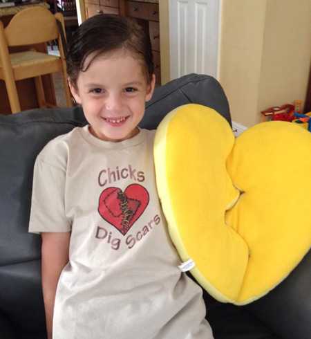 Caden holding a stuffed heart