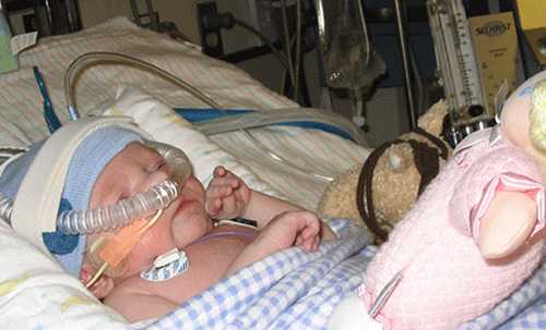 Piper in the hospital as an infant