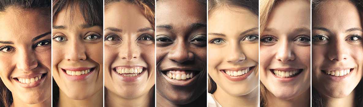 Line of women's faces smiling