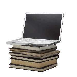 Laptop on a stack of books