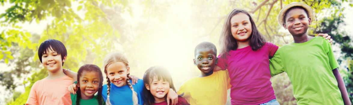 Photo of diverse children smiling