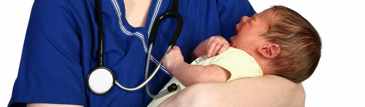 Physician holding newborn