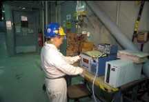 Technician Calibrating Air Monitoring Device