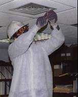 Man working on an airduct.