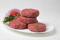 Photo beef patties on a plate.