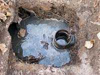 Image of a septic tank inlet.
