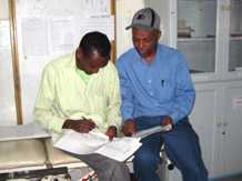 CDC's Tesfaye Beyleyegn and EHNRI's Hailemariam Hailemichael at a regional hospital.
