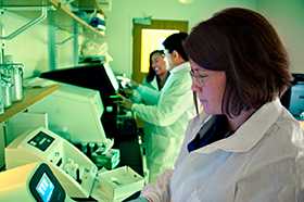 Scientists in Listeria lab