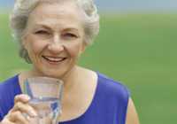 Photo: Older Lady Drinking Water from Glass