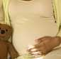 Pregnant Lady and teddy bear
