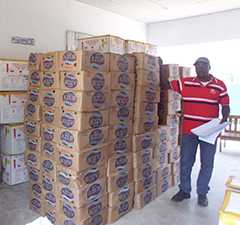 Boxes of soap are ready in a warehouse in Cameroon. One bar will be given to each person who receives the oral cholera vaccine, along with instructions on the importance of handwashing to prevent disease.