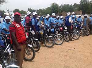 Community health workers use motorcycles to travel to different villages, where they will distribute the oral cholera vaccine door-to-door.