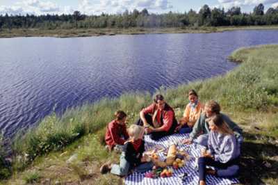 People having a picnic by the water