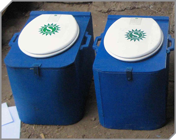 2 blue box shaped sanitation toilets in a row