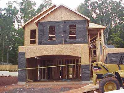 Two-story home that workers were framing.