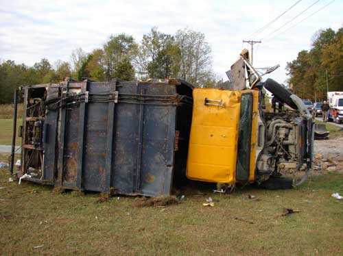 waste truck rolled over