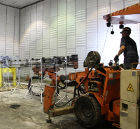 NIOSH researcher using jumbo drill to measure noise emissions in hemi-anechoic chamber
