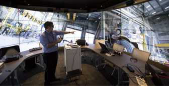 Orr points out details in a 360-degree view of a maintenance shop.