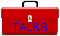 Standard red toolbox with the word TALKS stenciled on the sized.