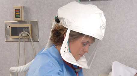 Powered air-purifying respirator being utilized by a healthcare worker.