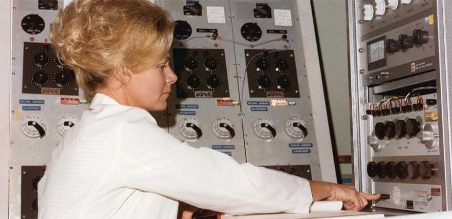 Technician monitors assay of nuclear material (Department of Energy Image Archive)