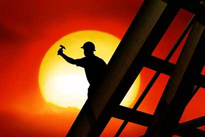 silhouette of a person on a construction site