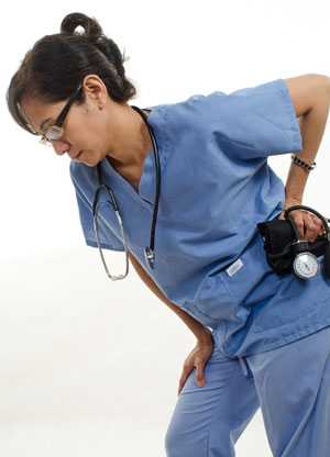 	A nurse suffers from lower back pain