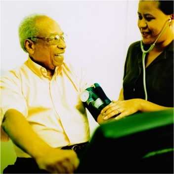 nurse taking blood pressure on a man