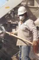 worker wearing particulate respirator