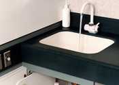 	Running sink with anti-bacterial soap on sink