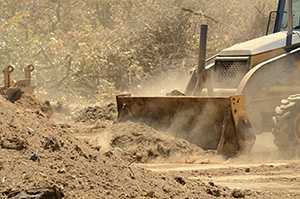 	Bulldozing Back Dirt