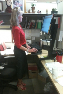 woman using a standing desk