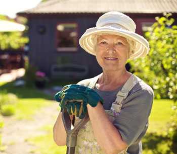 image of a women gardening