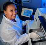 A researcher uses a DNA sequencer to analyze samples