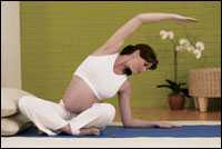 	pregnant woman doing yoga