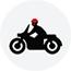 a person riding a motorcycle and wearing a helmet