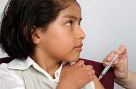 Photo of young girl receiving a polio vaccine injection