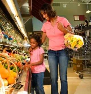 Mother and daughter at grocery store