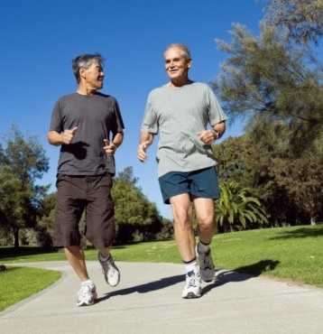 Older men outside jogging