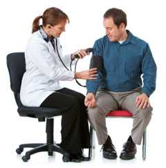 Doctor taking a patient's blood pressure